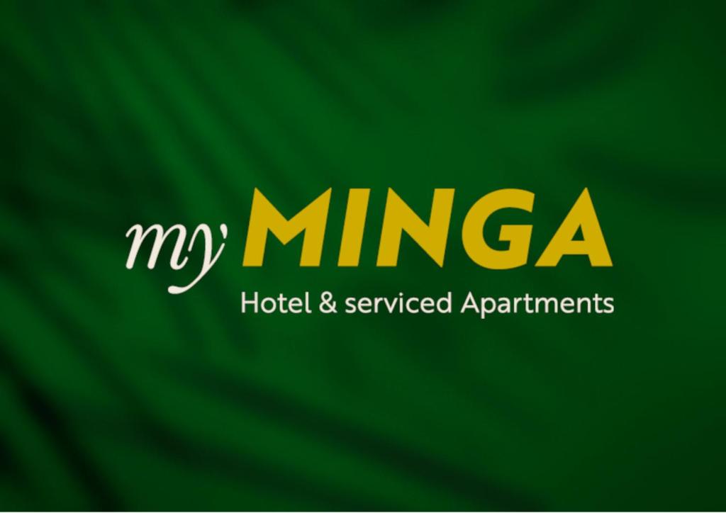a sign that reads my minea hospital and serviced apartments at myMINGA4 - Hotel & serviced Apartments in Munich