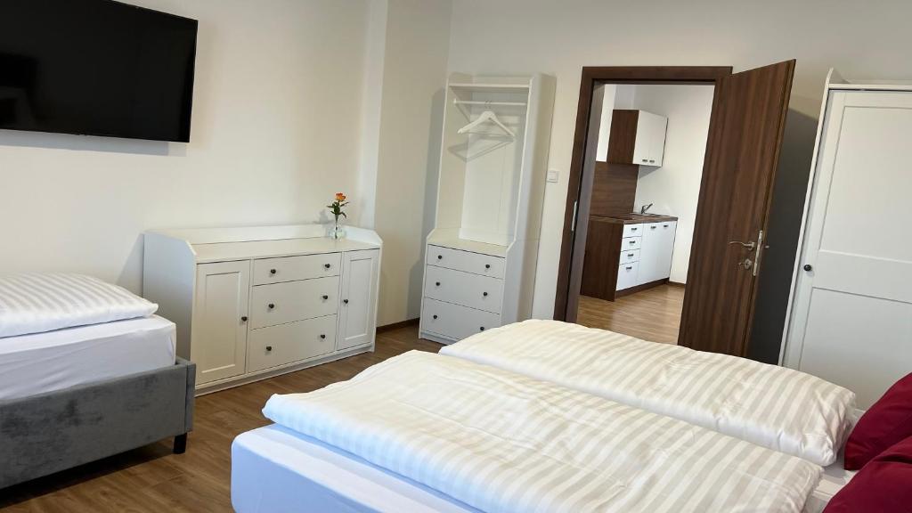 Postel nebo postele na pokoji v ubytování Penzión MELIS