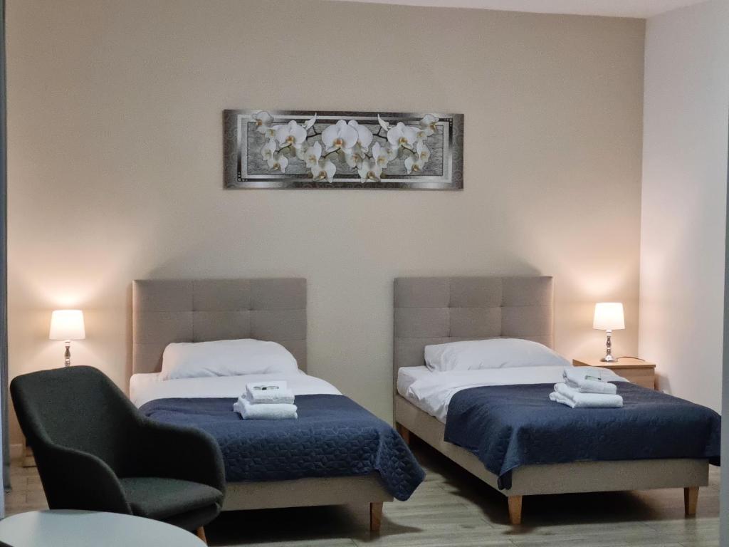 Postel nebo postele na pokoji v ubytování H2U LUX Hostel Dla Ciebie