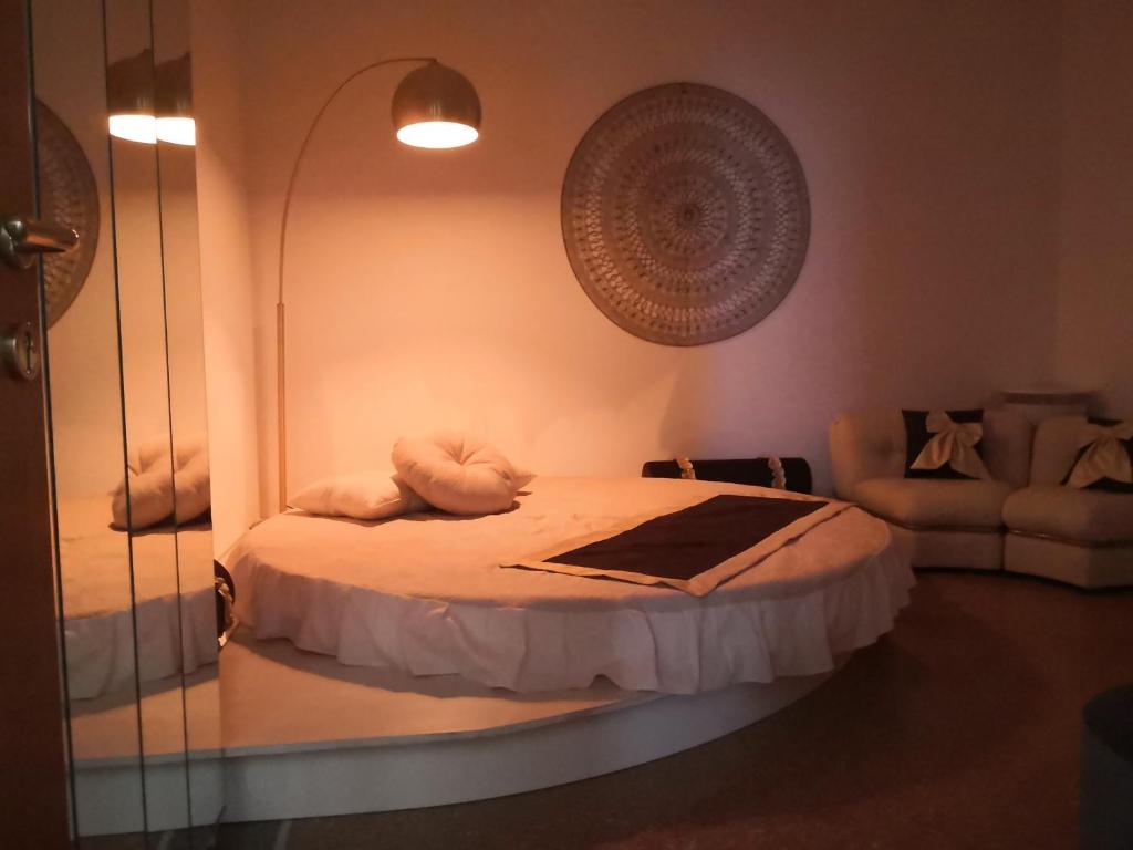 Postel nebo postele na pokoji v ubytování Babbo maison