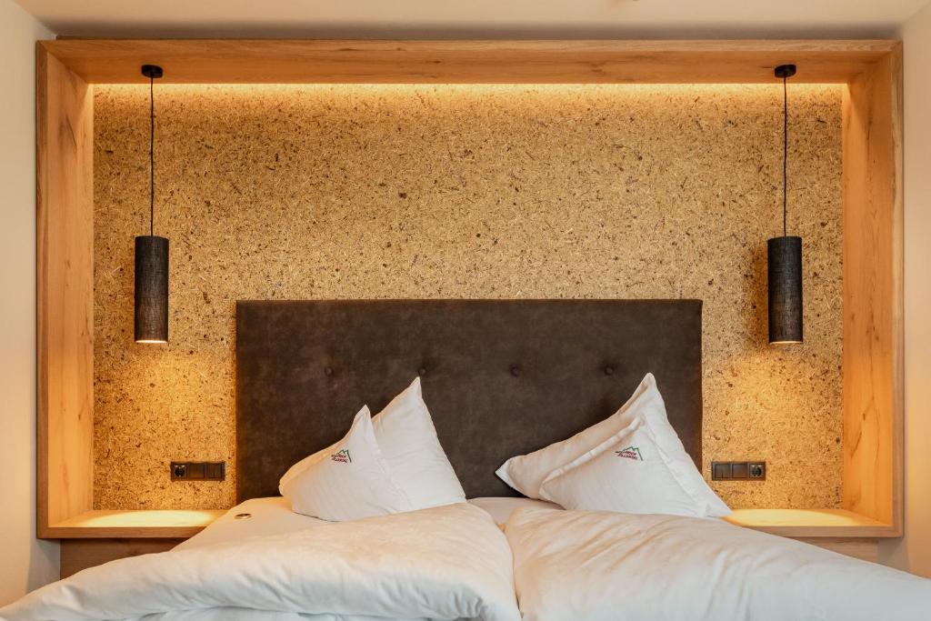 Posteľ alebo postele v izbe v ubytovaní Kräuterhotel Hochzillertal