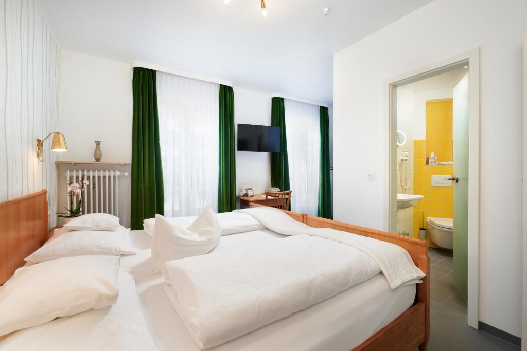 Postel nebo postele na pokoji v ubytování Design-Boutique Hotel Vosteen