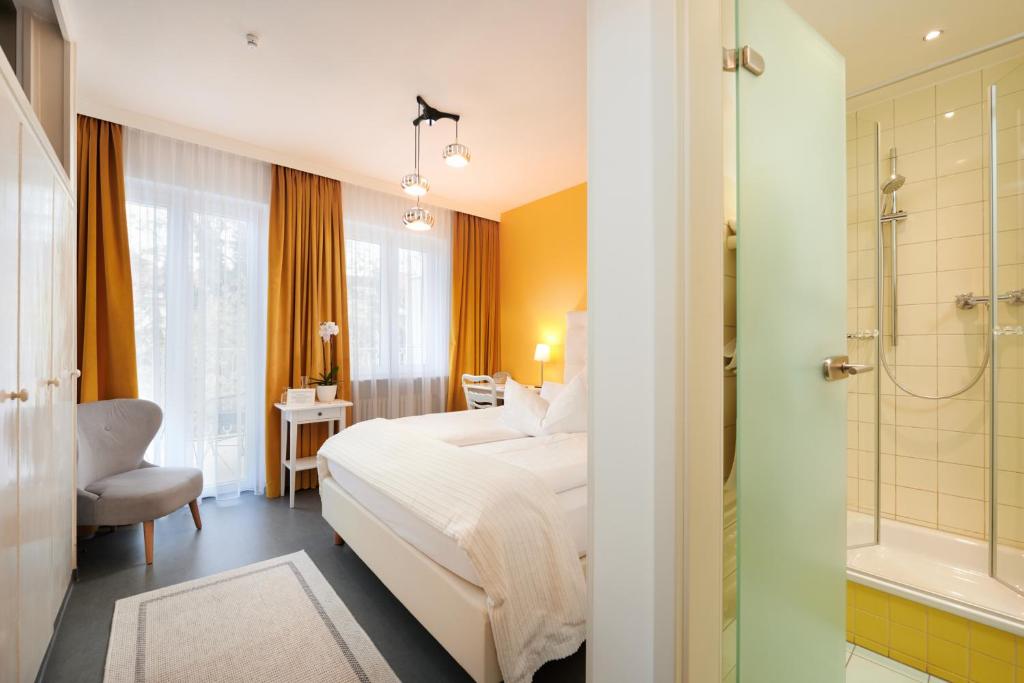 Postel nebo postele na pokoji v ubytování Design-Boutique Hotel Vosteen