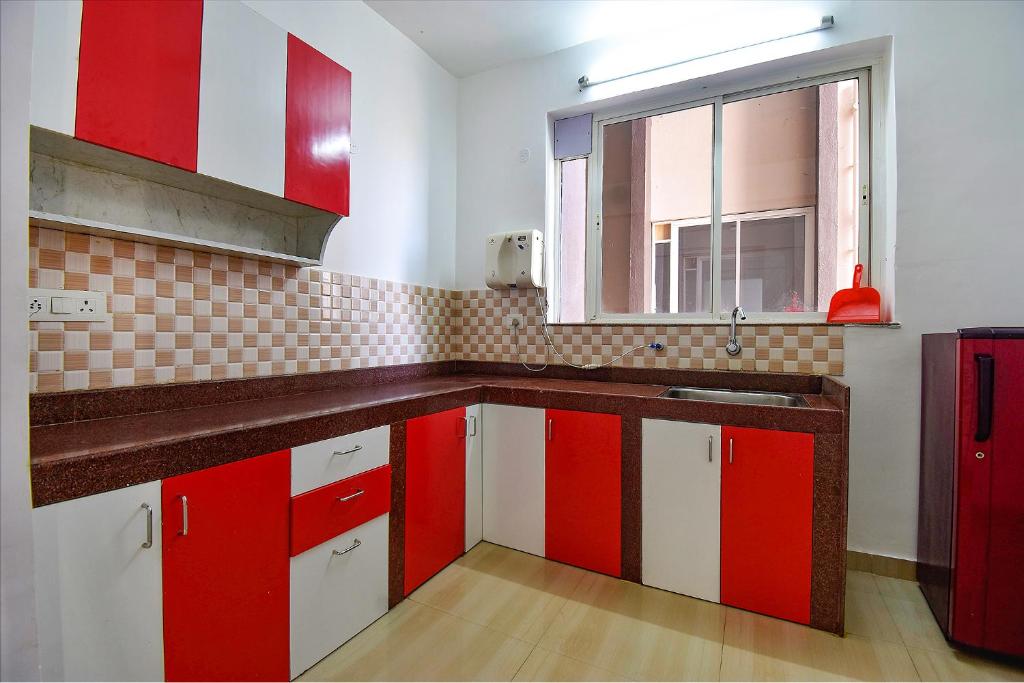 Kuchyň nebo kuchyňský kout v ubytování FabHotel Ocean View Apartment - Nr Dabolim Airport