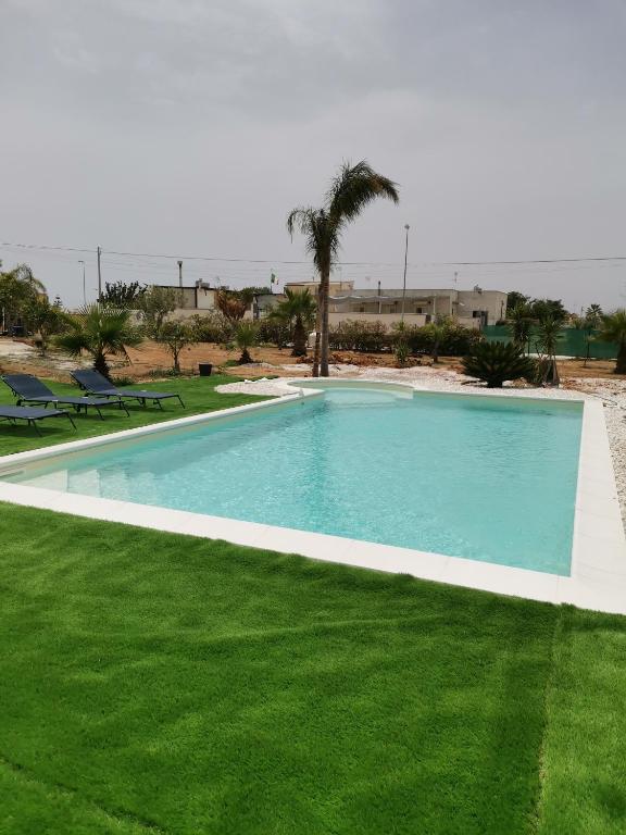 The swimming pool at or close to Orizzonte Templi Selinunte - Triscina