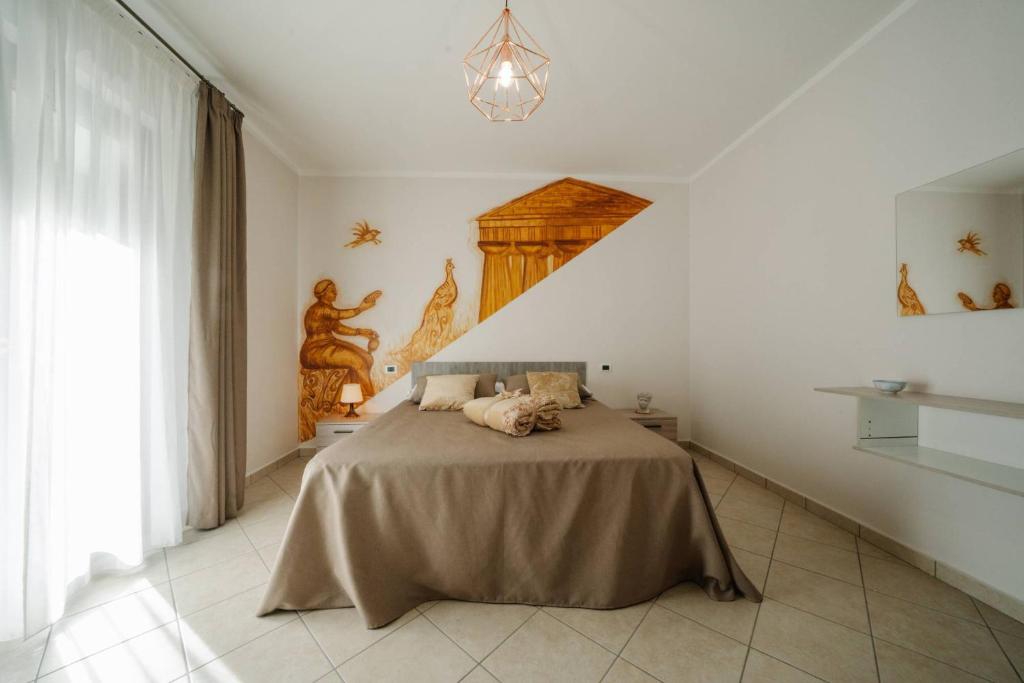 A bed or beds in a room at Agriturismo Tenuta Don Carlo