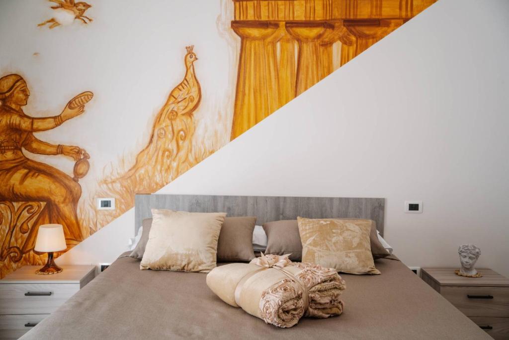 A bed or beds in a room at Agriturismo Tenuta Don Carlo
