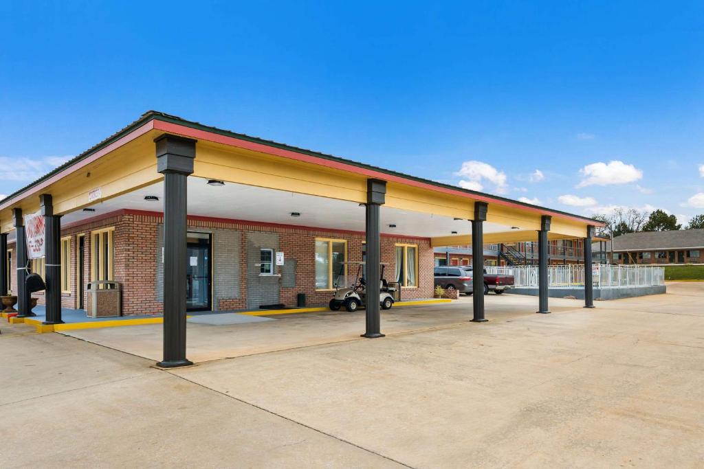 a large gas station with a lot of poles at Econo Lodge Russellville in Russellville
