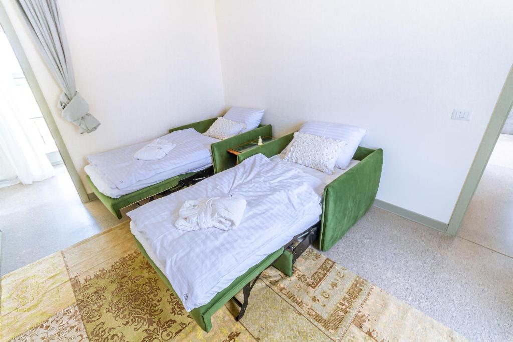 Postel nebo postele na pokoji v ubytování Vila Brinovka