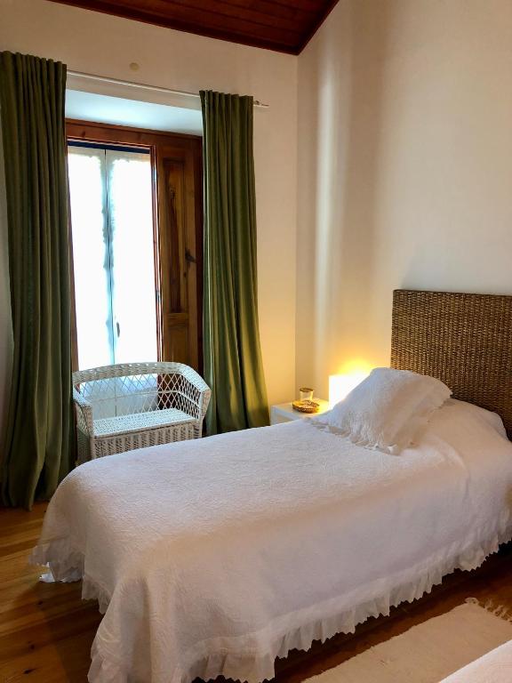 Uma cama ou camas num quarto em Quinta Dos Anjos
