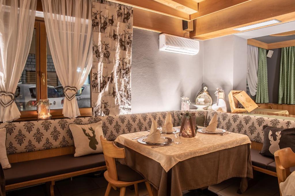 Posezení v ubytování Hotel Eccher 3 stelle Superior