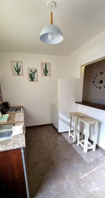 Una televisión o centro de entretenimiento en Duplex Boulevard D