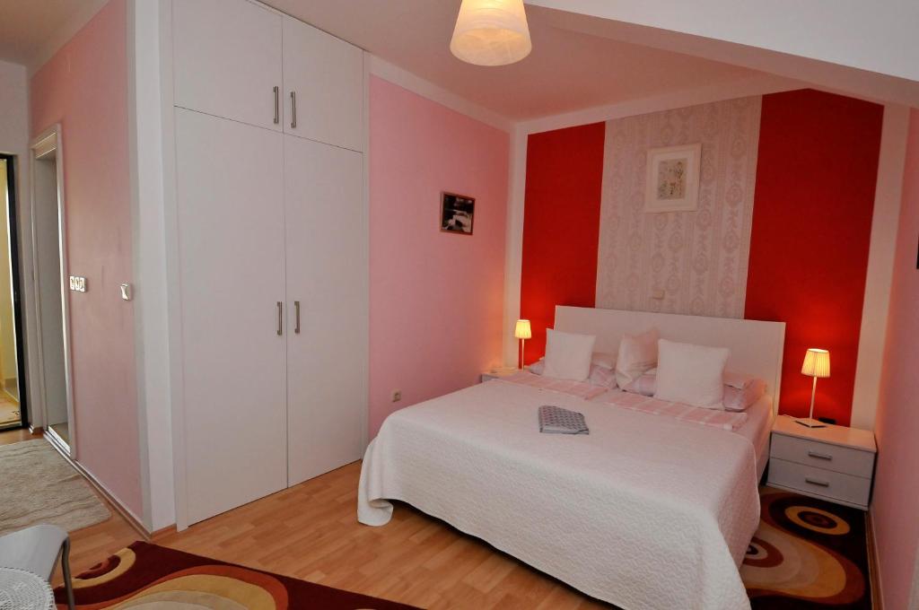 Postel nebo postele na pokoji v ubytování Hotel Haus Am Meer Cavtat