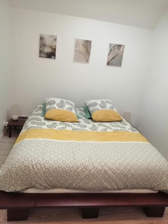 Postel nebo postele na pokoji v ubytování Appart'Hôtel Lagnieu