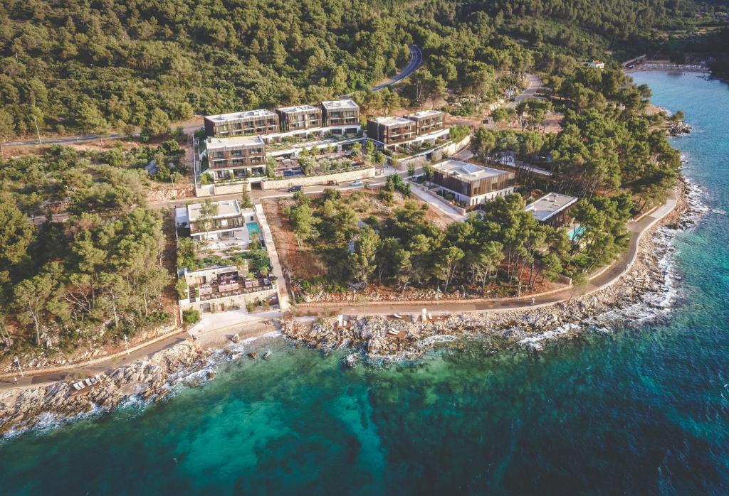 an aerial view of a resort on the water at Maslina Resort in Stari Grad