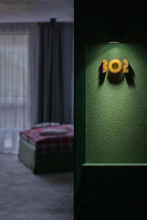 Postel nebo postele na pokoji v ubytování Hotel COTA1110