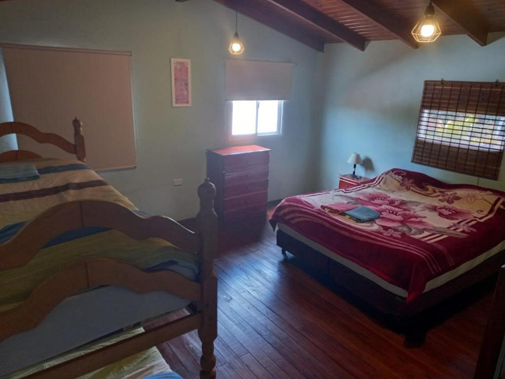 Postel nebo postele na pokoji v ubytování Complejo Solar Del Iguazu 2