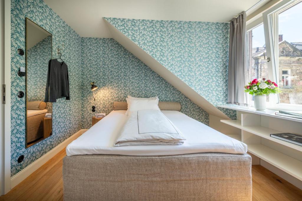 Postel nebo postele na pokoji v ubytování Renthof Kassel