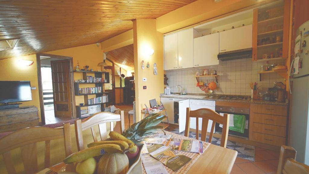 Kuchnia lub aneks kuchenny w obiekcie Etna Rooftop Apartment