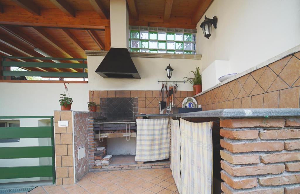 Kuchnia lub aneks kuchenny w obiekcie Etna Rooftop Apartment