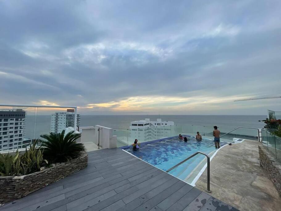 a swimming pool on the roof of a building at Reserva del Mar, Hermoso lugar de Descanso en Santa Marta in Gaira