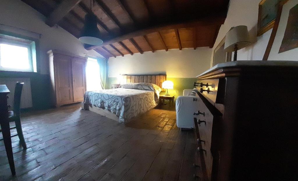 Posteľ alebo postele v izbe v ubytovaní Casa del Piano
