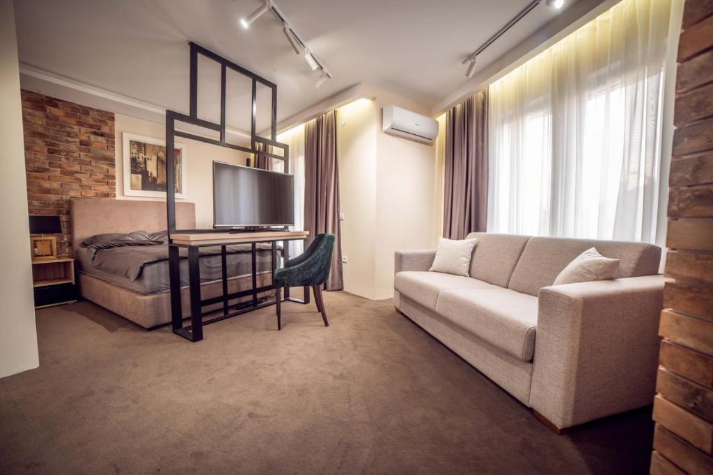 TV a/nebo společenská místnost v ubytování SZUR Home
