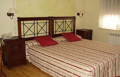 Postel nebo postele na pokoji v ubytování La Becera
