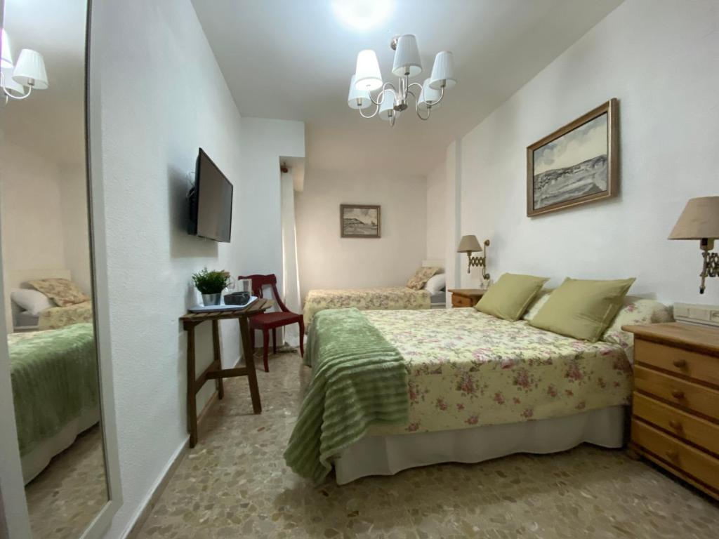 Cama o camas de una habitación en Downtown Valencia