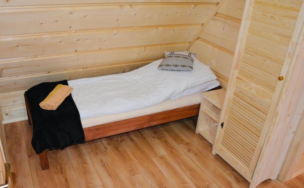 Posteľ alebo postele v izbe v ubytovaní Apartamenty na starej drodze