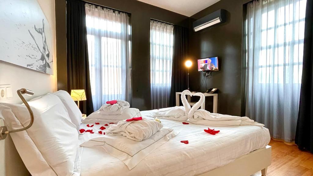 Postel nebo postele na pokoji v ubytování Arc My Otel