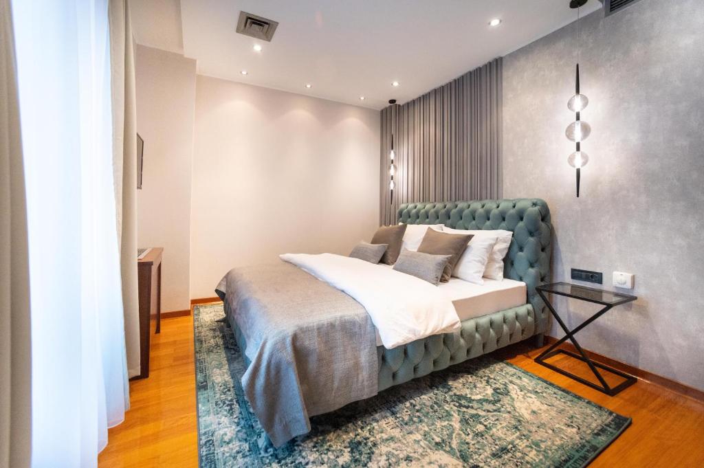 Voodi või voodid majutusasutuse NATALI Luxury suites toas