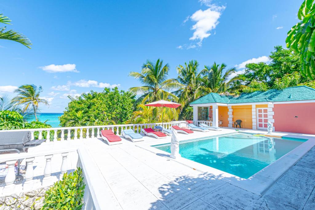 The swimming pool at or close to Sunshine Studio at Viking Hill - Love Beach