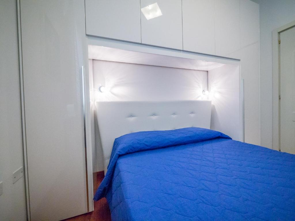 A bed or beds in a room at Villa Bellini Room&Breakfast