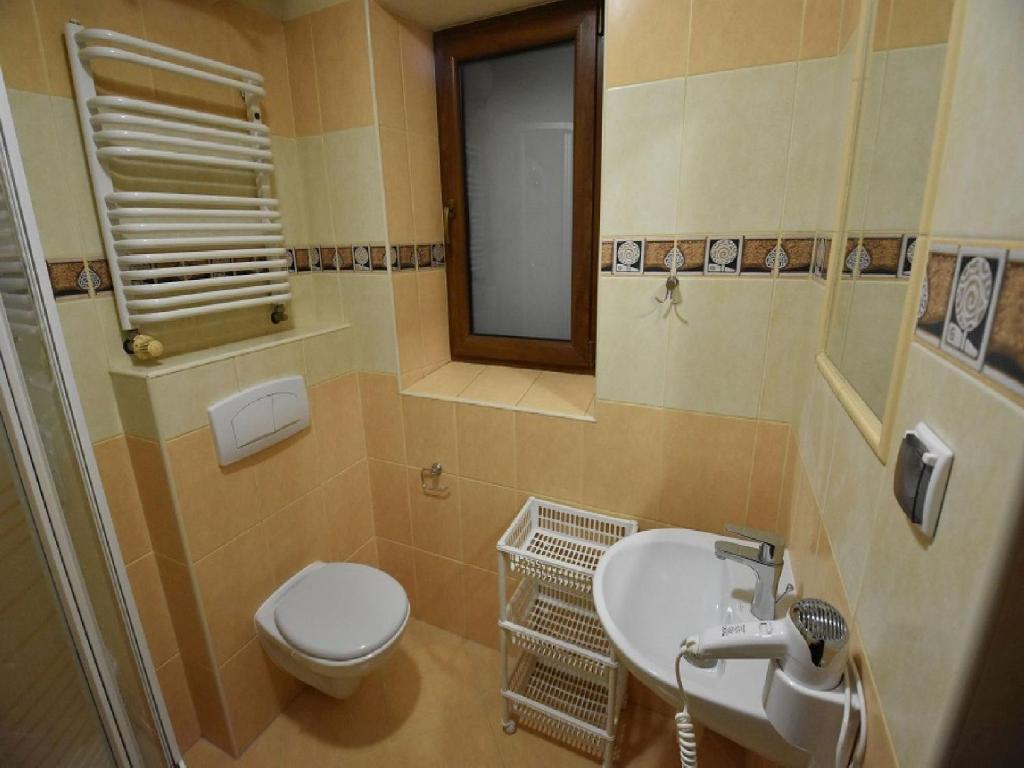 Kúpeľňa v ubytovaní Pokoje Gościnne Budzowie