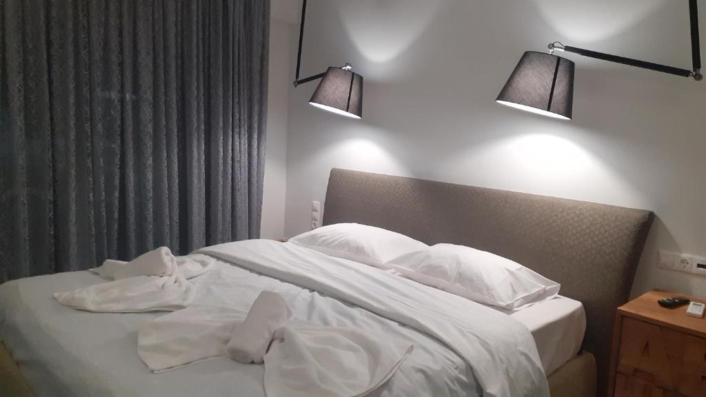 A bed or beds in a room at GIANNIS