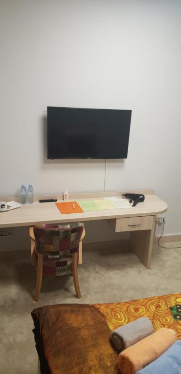 TV a/nebo společenská místnost v ubytování SMART