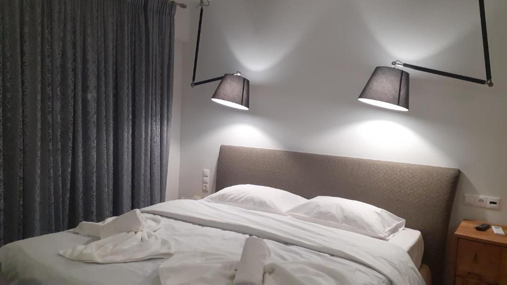 A bed or beds in a room at GIANNIS