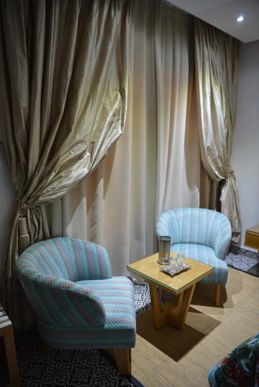Posezení v ubytování Aralia Boutique Hôtel