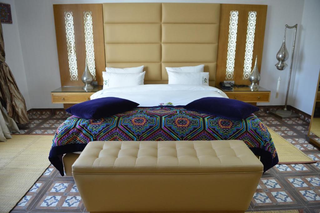 Postel nebo postele na pokoji v ubytování Aralia Boutique Hôtel