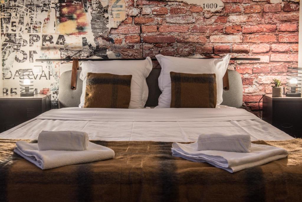 Postel nebo postele na pokoji v ubytování NOUVEAU - L'Atelier - Centre Ville