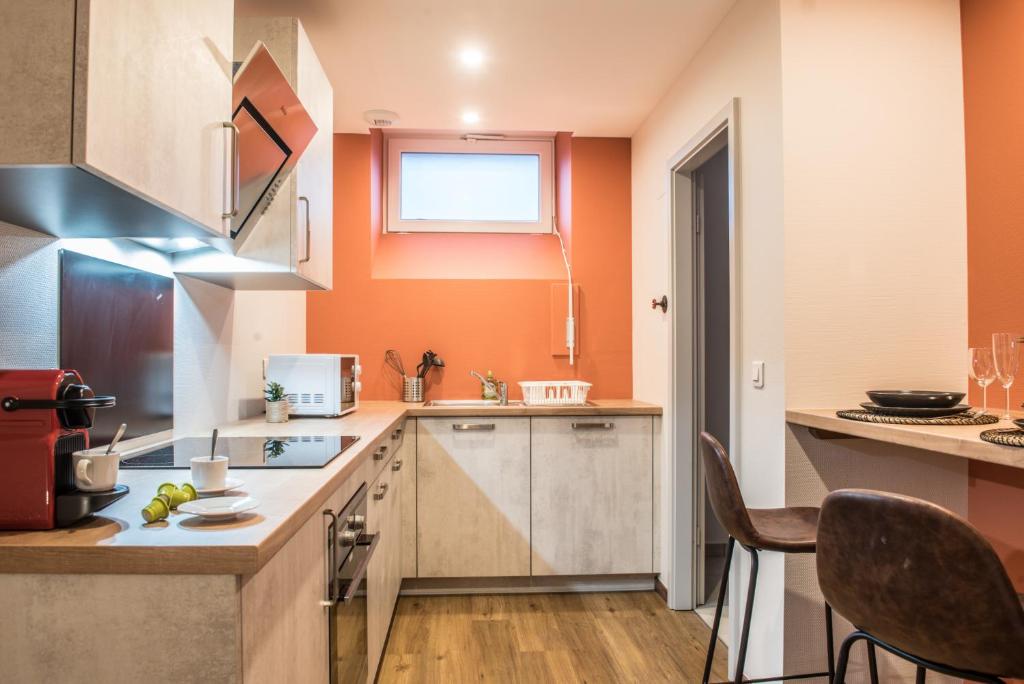 Kuchyň nebo kuchyňský kout v ubytování NOUVEAU - L'Atelier - Centre Ville