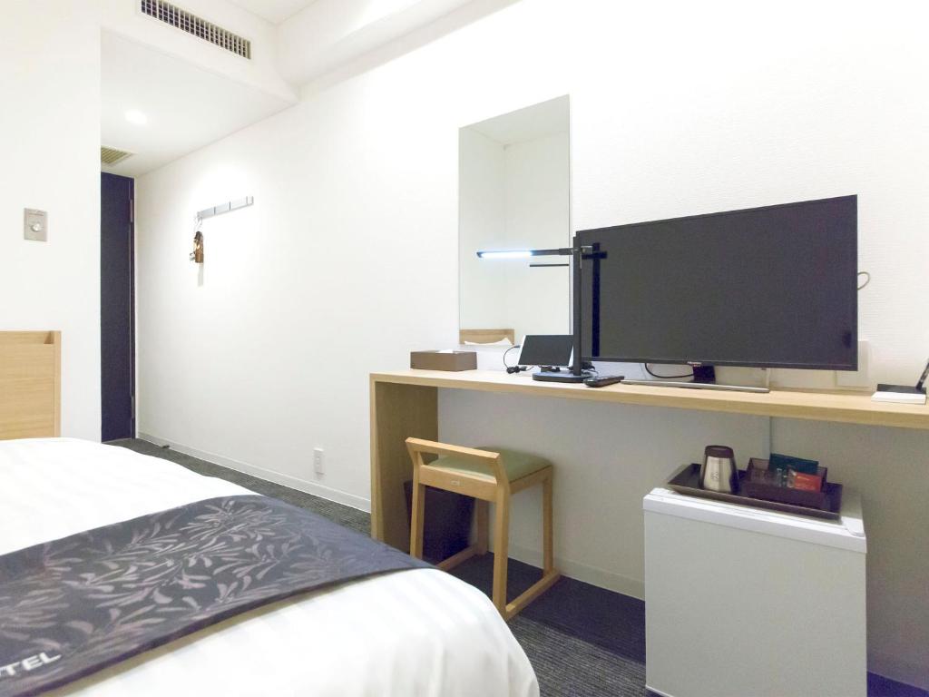 TV a/nebo společenská místnost v ubytování H.B.P HOTEL