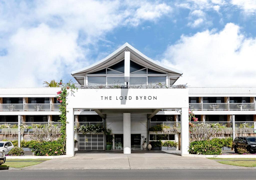 a building with a sign that reads the lord bryan at The Lord Byron in Byron Bay