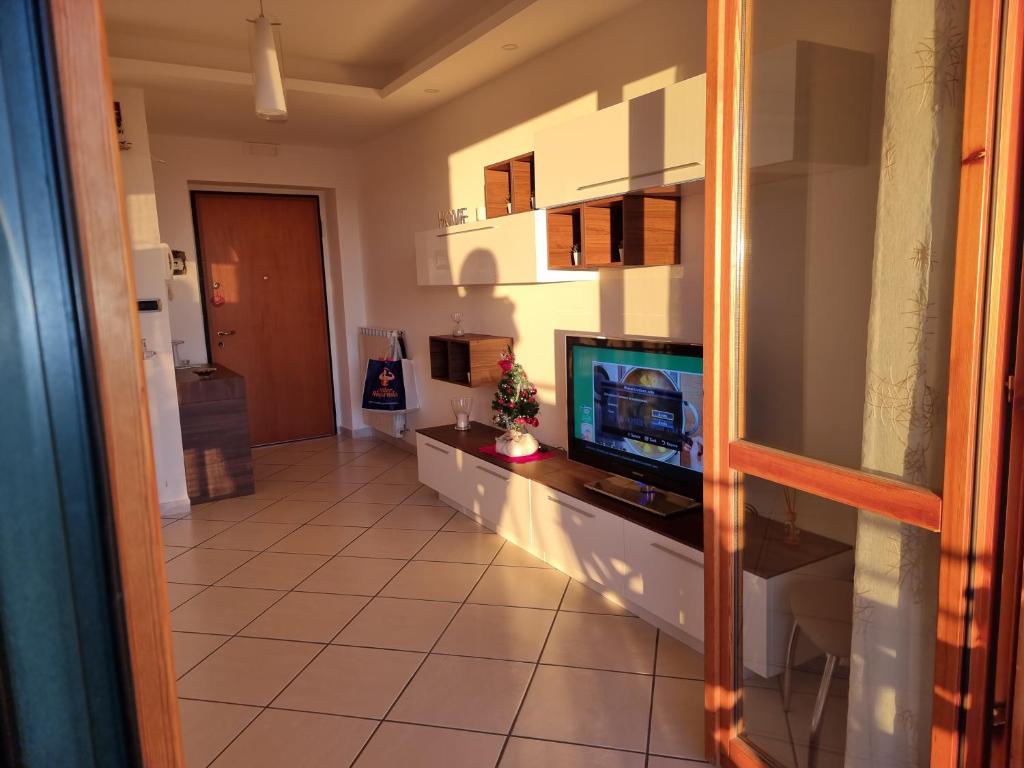 Telewizja i/lub zestaw kina domowego w obiekcie NickyHouse Holiday Home