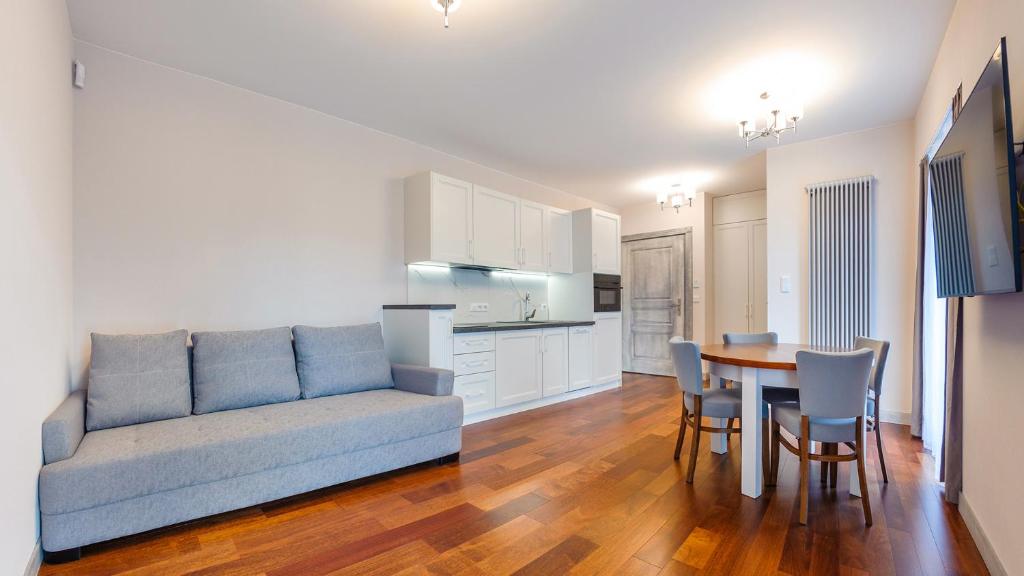 Kuchyňa alebo kuchynka v ubytovaní Apartamenty Sopockie Błonie