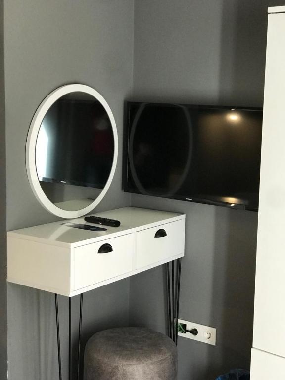TV a/nebo společenská místnost v ubytování Utarit Hotel