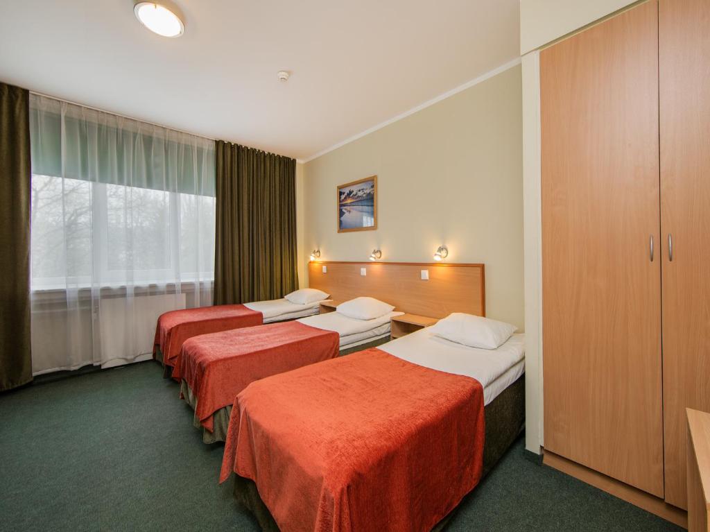 Postel nebo postele na pokoji v ubytování Arabella Hotel