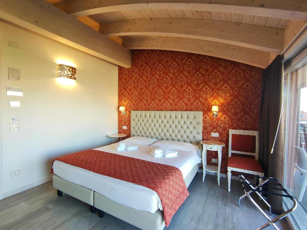 Postel nebo postele na pokoji v ubytování Nuova Opera Rooms