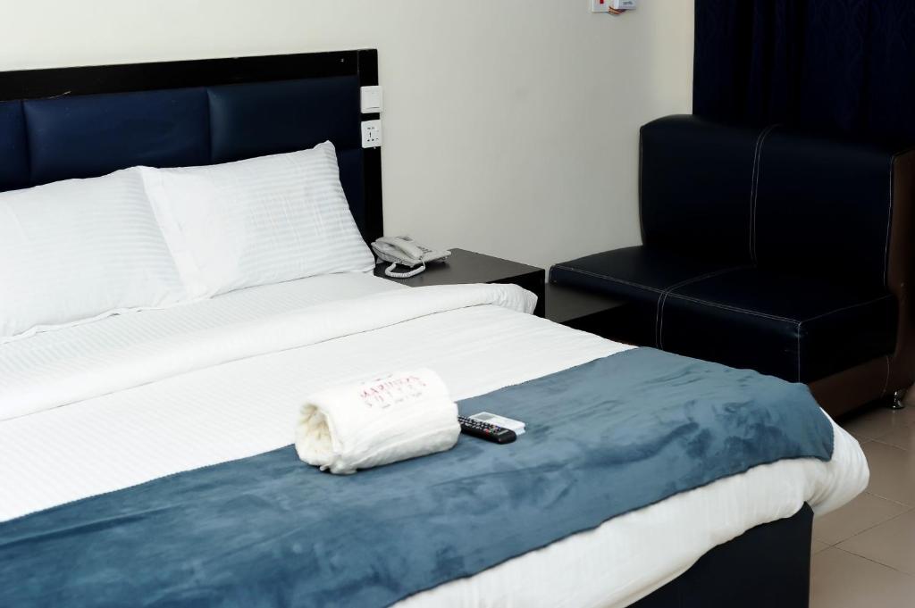 Cama o camas de una habitación en Mariners Suites Lagos